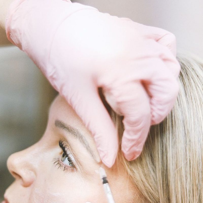 Close-up of a cosmetic treatment with injection at a modern beauty clinic.